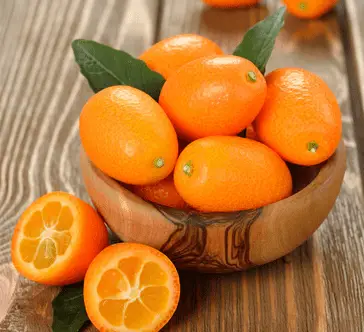 a bowl of kumquats