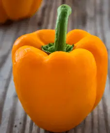 an orange bell pepper