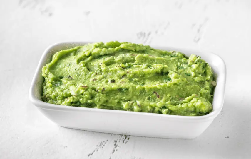 casserole dish filled with guacamole